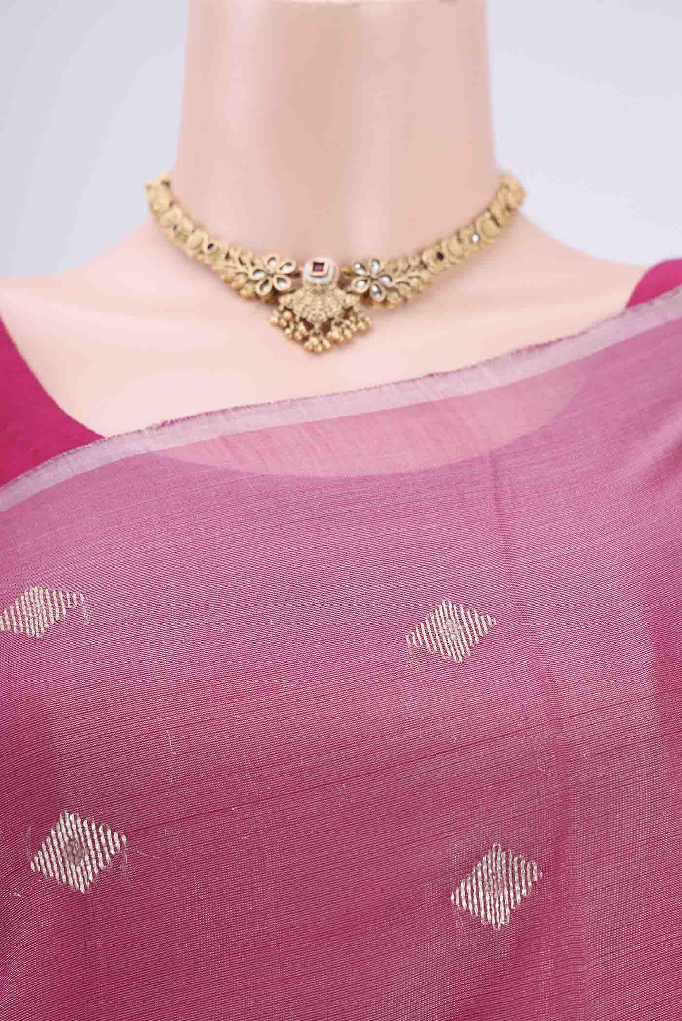 Border image of Pink MP Tussar Saree with Zari Butta on the body and Zari Border. 