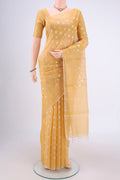 Yellow MP Tussar Saree with Zari Butta on the body and Zari Border.  displayed on a mannequin
