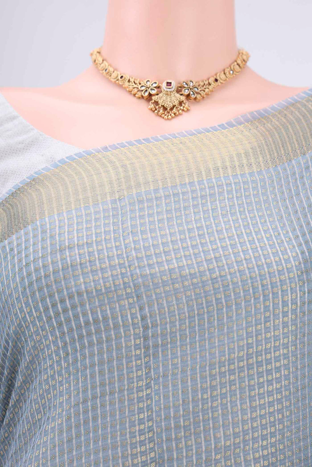 Border image of Blue MP Tussar Saree with Checked design on the body and Temple Border. 