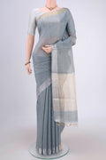 Blue MP Tussar Saree with Checked design on the body and Temple Border.  displayed on a mannequin