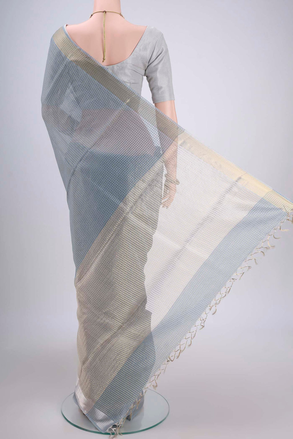 Flat view of Blue MP Tussar Saree with Checked design on the body and Temple Border. 