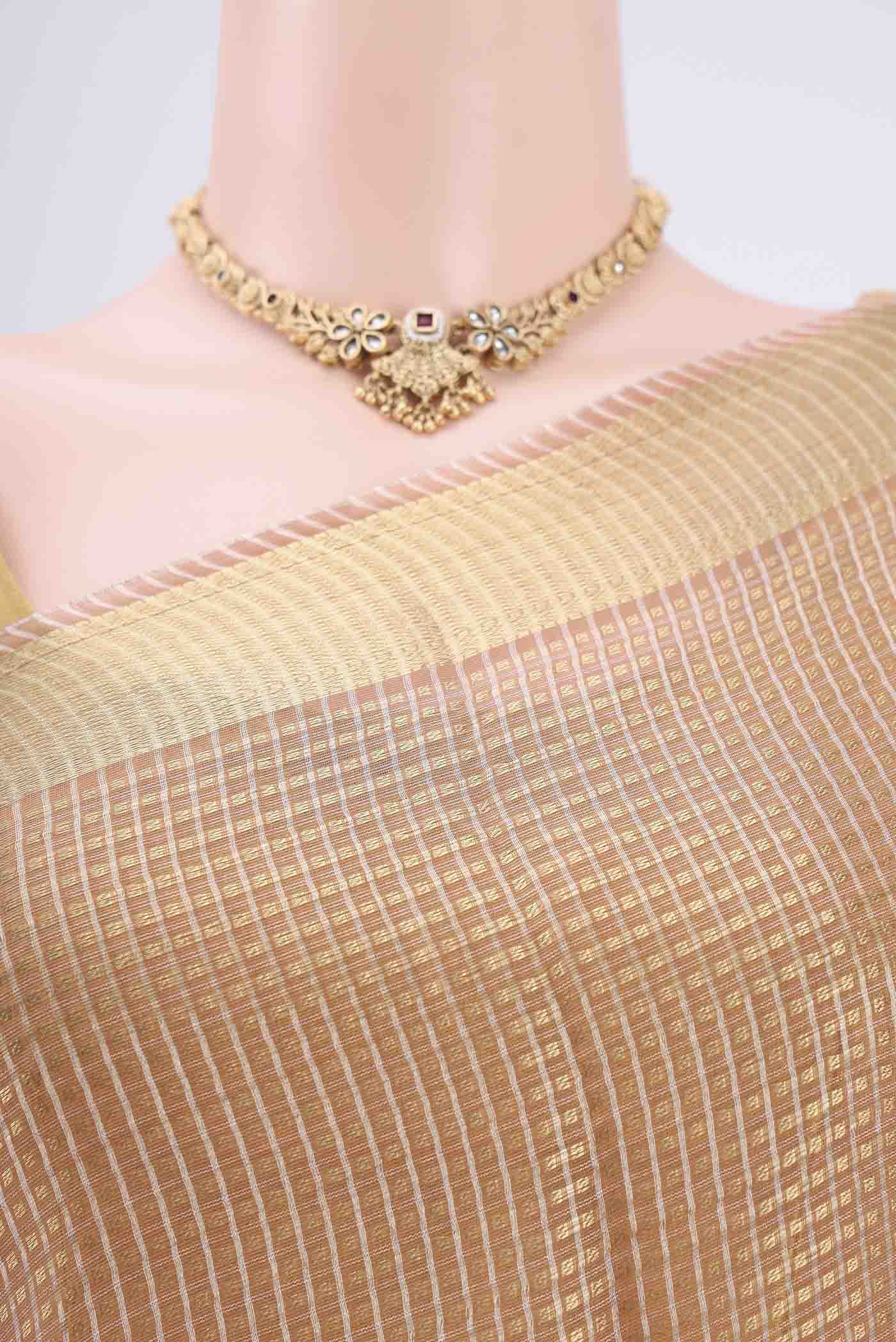 Border image of Peach MP Tussar Saree with Zari Butta on the body and Zari Border. 