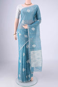 Light Blue MP Tussar Saree with Checked design on the body and Thin Zari Line.  displayed on a mannequin