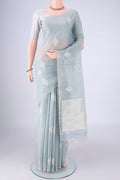 Sky Blue MP Tussar Saree with Checked design on the body and Thin Zari Line.  displayed on a mannequin