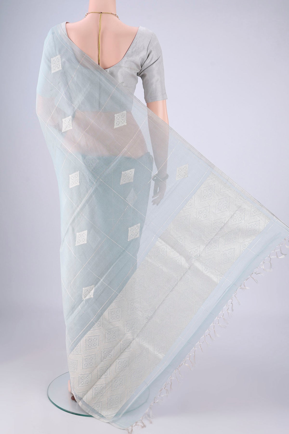 Flat view of Sky Blue MP Tussar Saree with Checked design on the body and Thin Zari Line. 