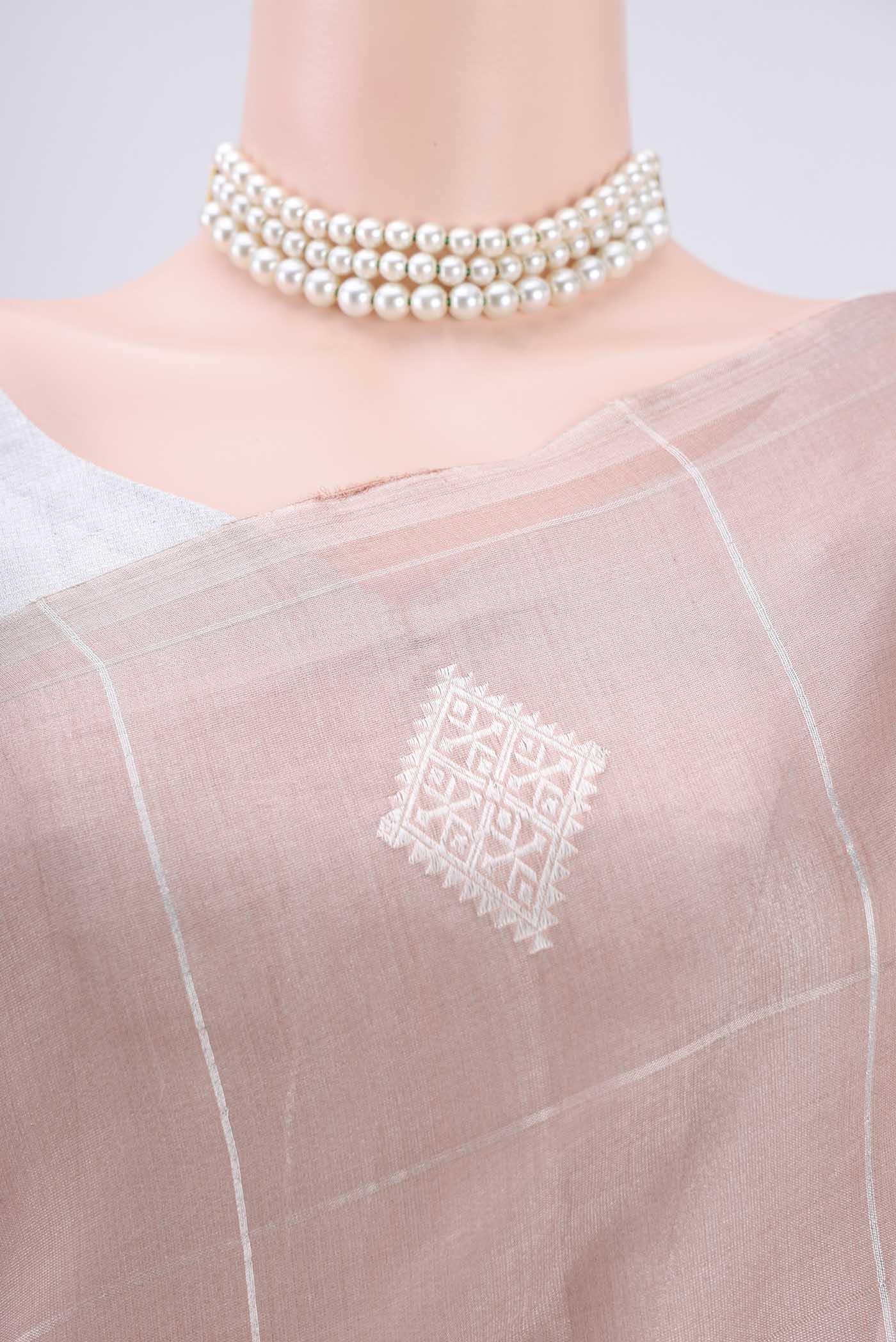 Border image of Peach MP Tussar Saree with Zari Butta on the body and Zari Border. 