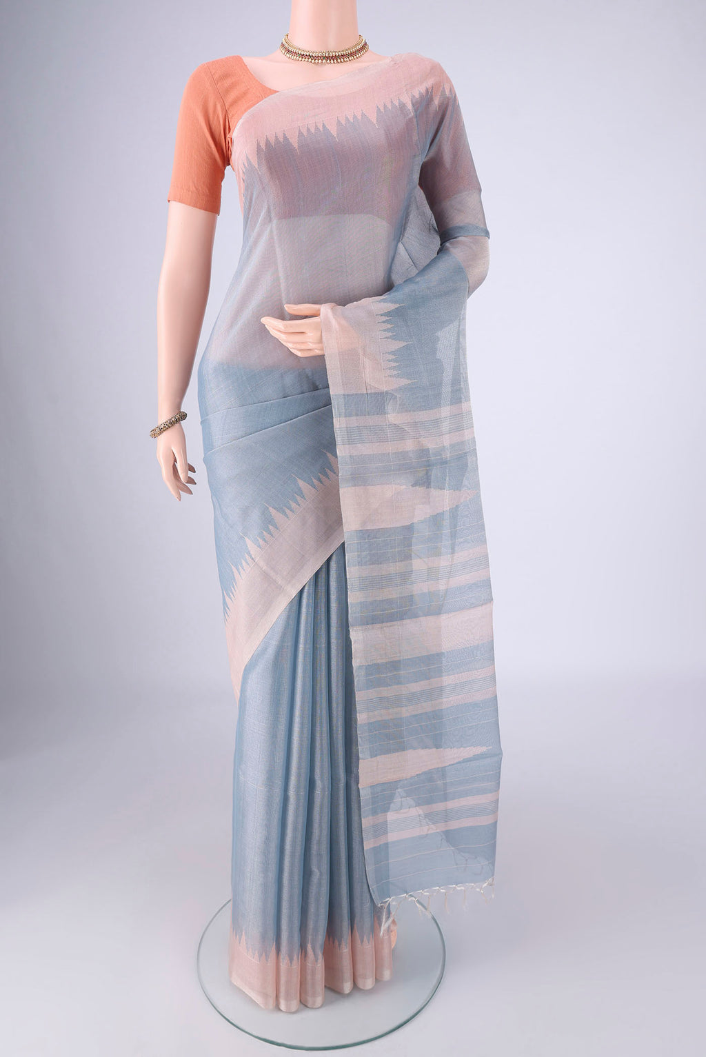 Sky Blue MP Tussar Saree with Plain Body and Temple Border.  displayed on a mannequin