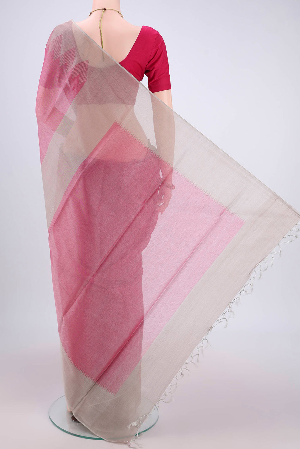Flat view of Pink MP Tussar Saree with Plain Body and Temple Border. 