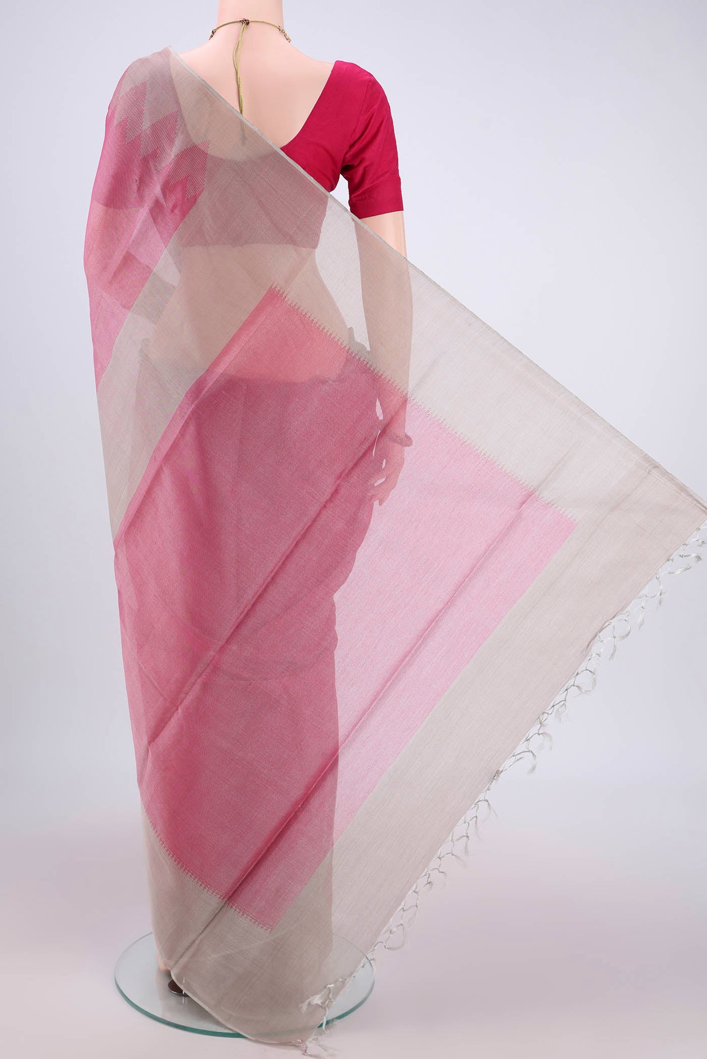 Flat view of Pink MP Tussar Saree with Plain Body and Temple Border. 