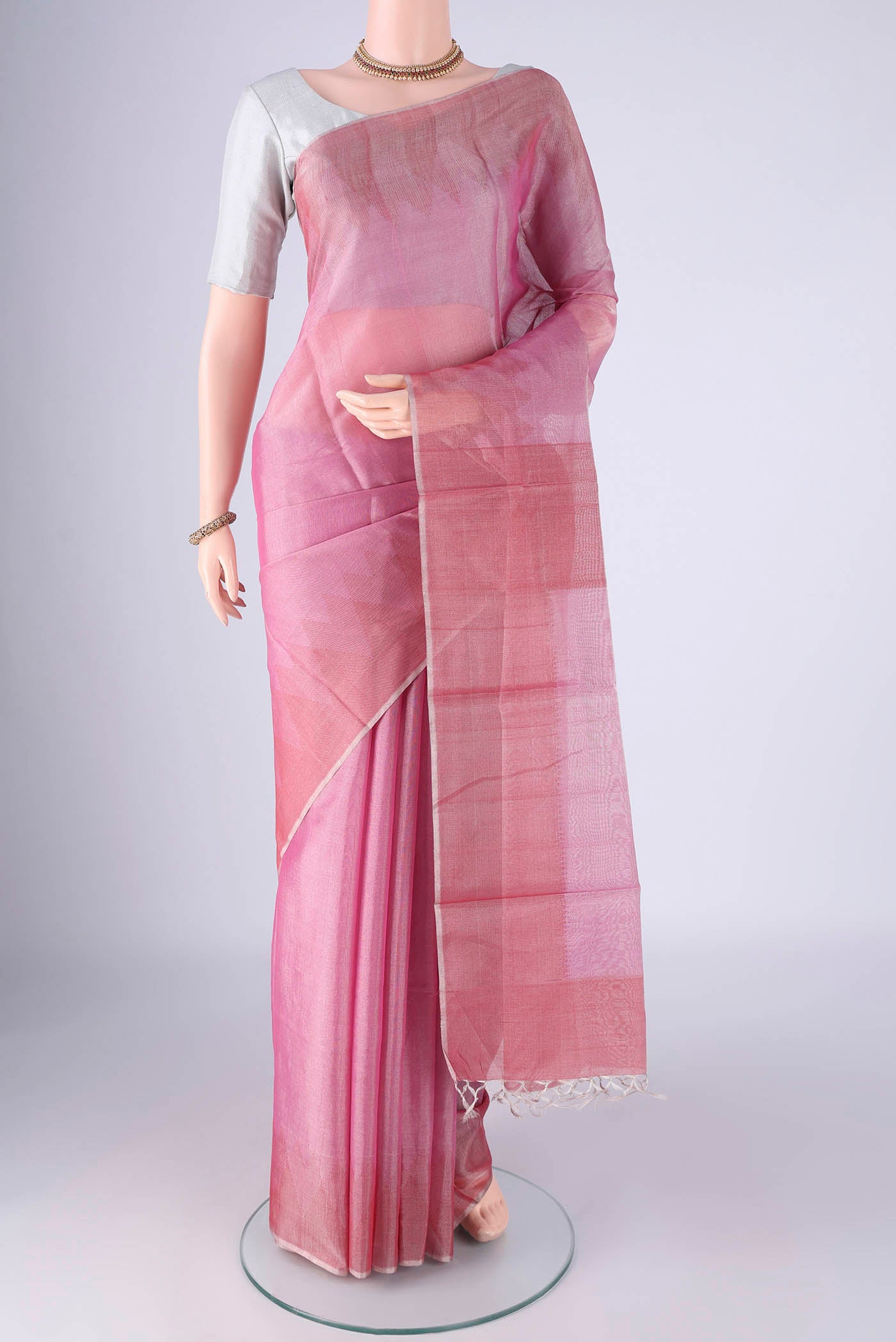 Pink MP Tussar Saree with Plain Body and Temple Border.  displayed on a mannequin
