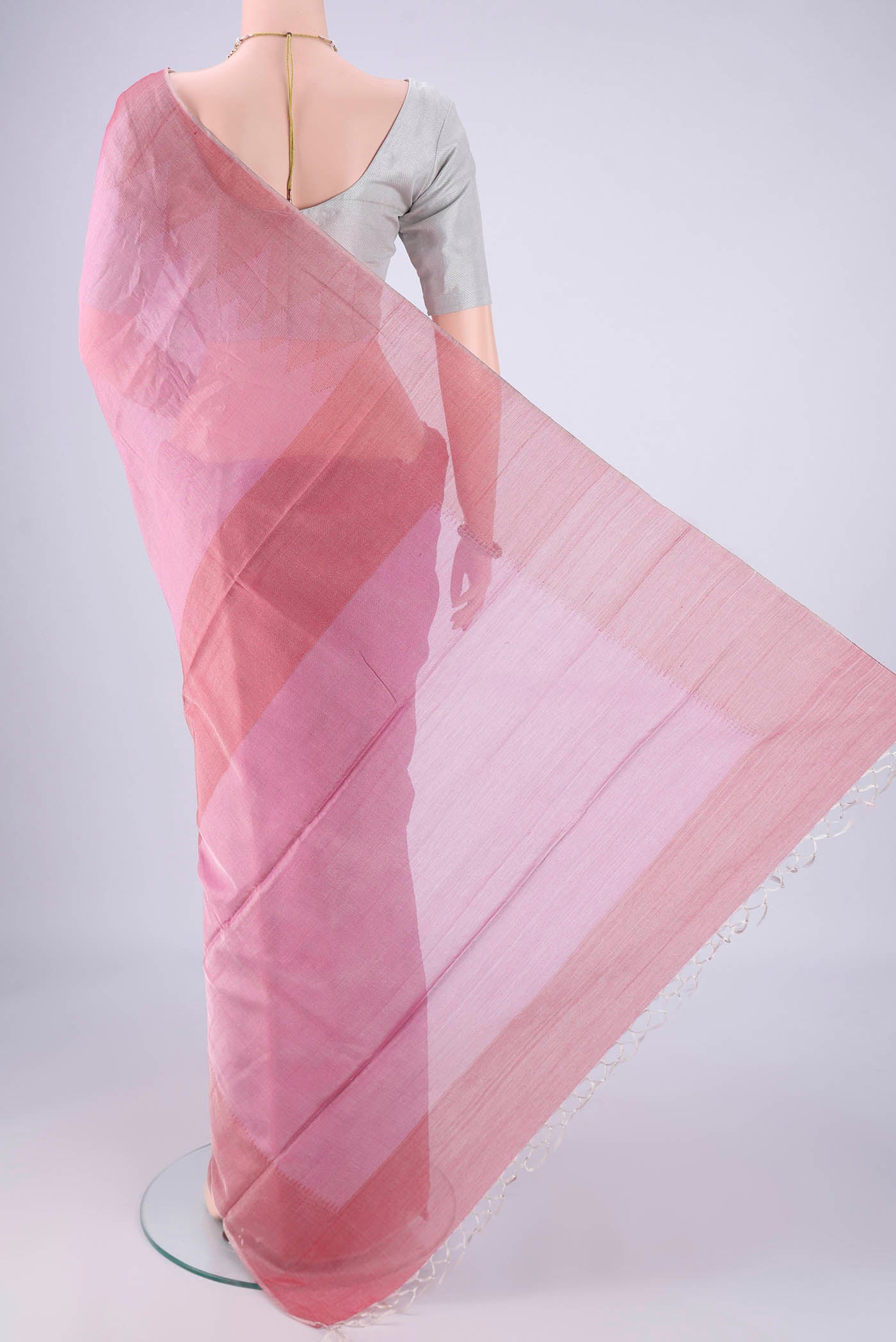 Flat view of Pink MP Tussar Saree with Plain Body and Temple Border. 
