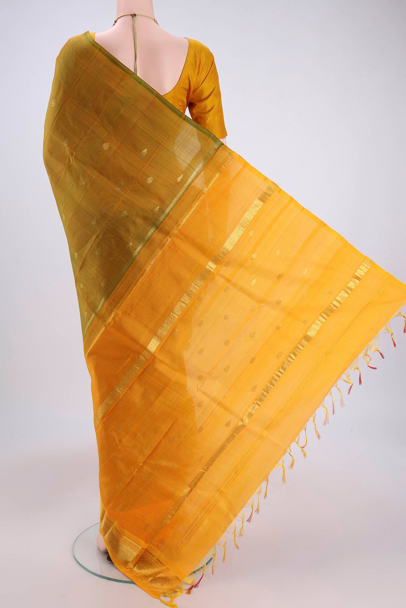 Flat view of Mehandi Green Dual Tone Kanjivaram Silk Saree with Zari Butta on the body and One Side Border. 
