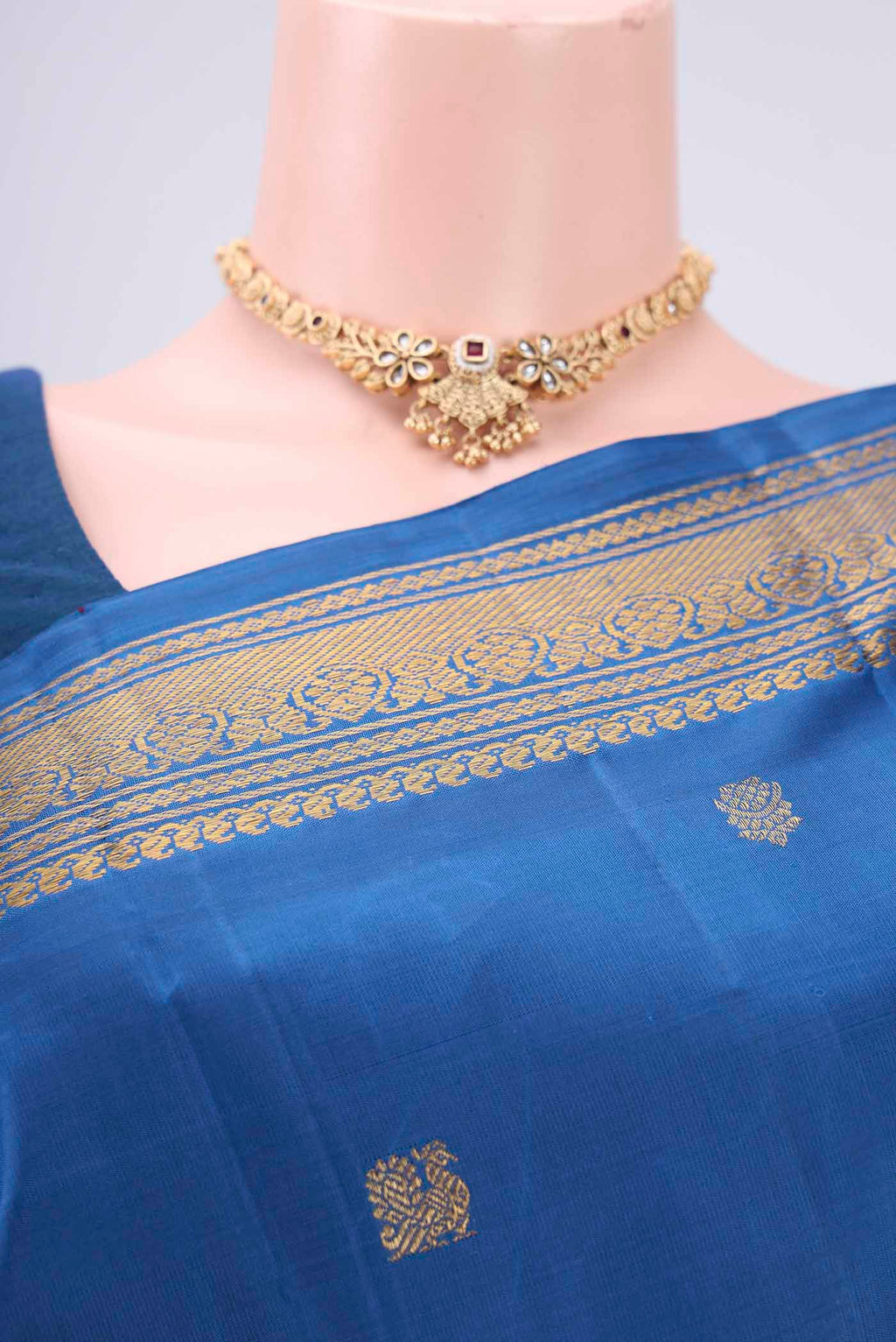 Border image of Pure Silk Pure Zari Blue Kanchipuram Saree with Zari Butta on the body and Zari Border. 