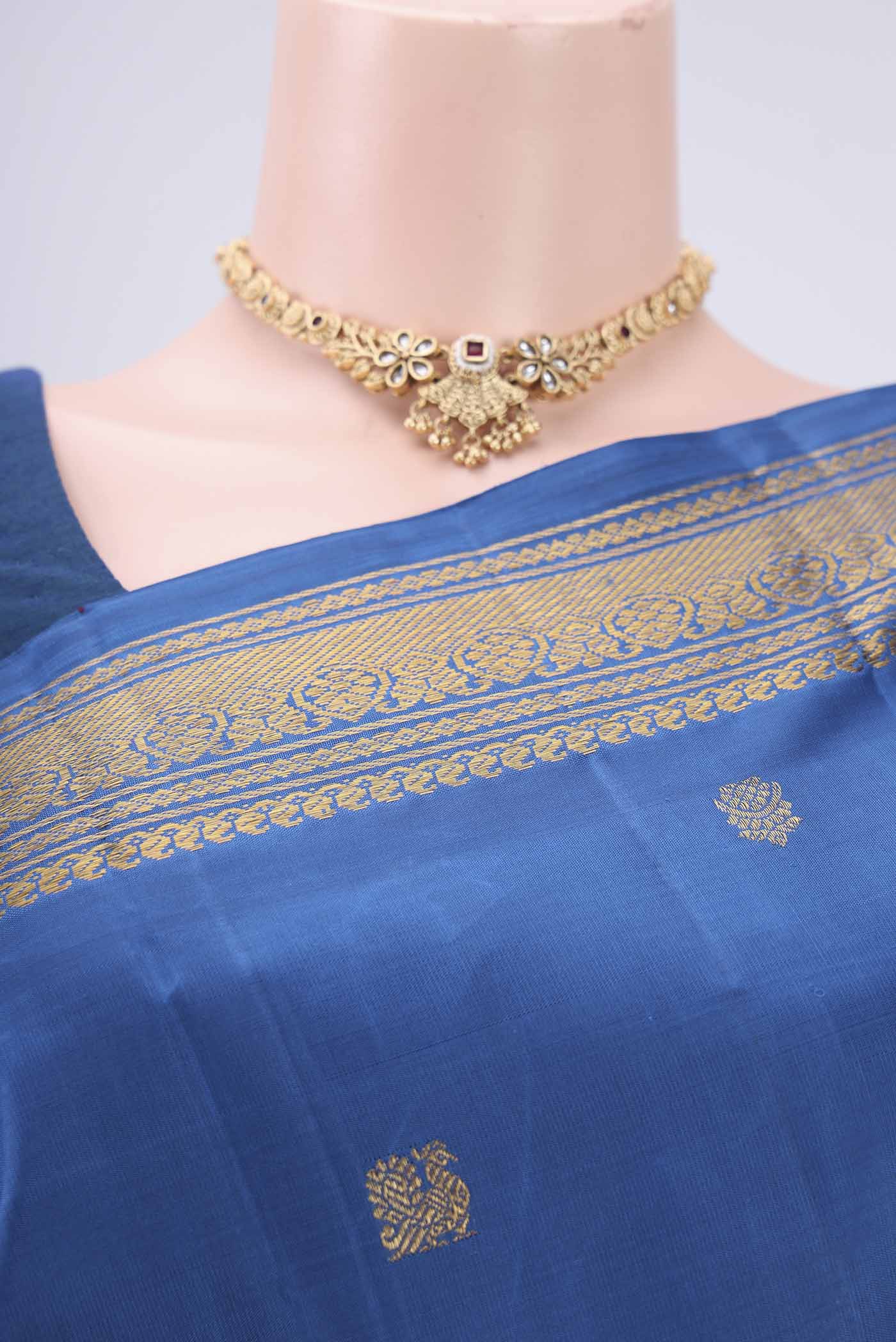 Border image of Pure Silk Pure Zari Blue Kanchipuram Saree with Zari Butta on the body and Zari Border. 