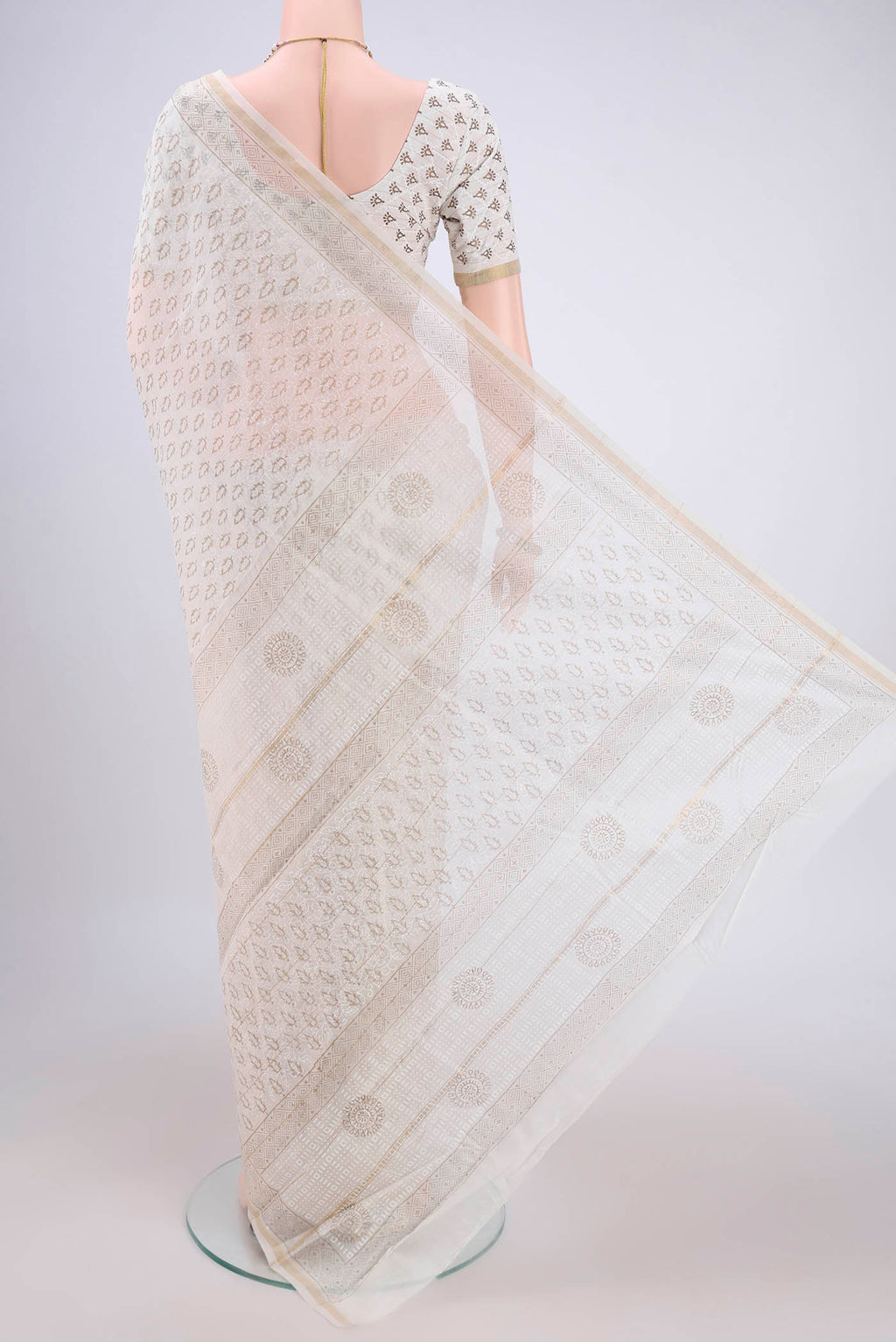 Flat view of Off White Maheshwari Silk Cotton Saree with Printed design on the body and Thin Zari Line. 