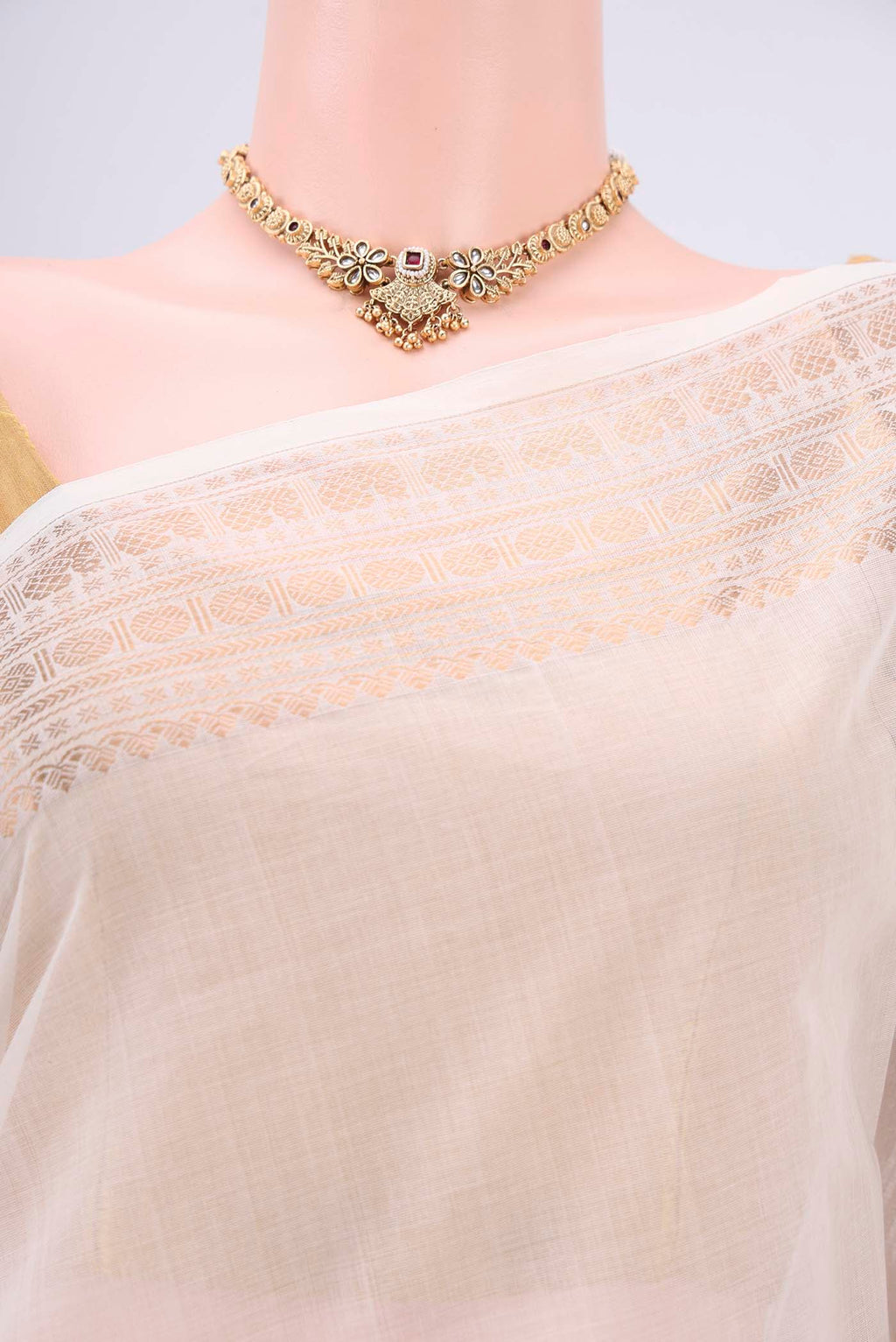 Border image of Off White Kanchi Cotton Saree with Plain Body and Zari Border. 