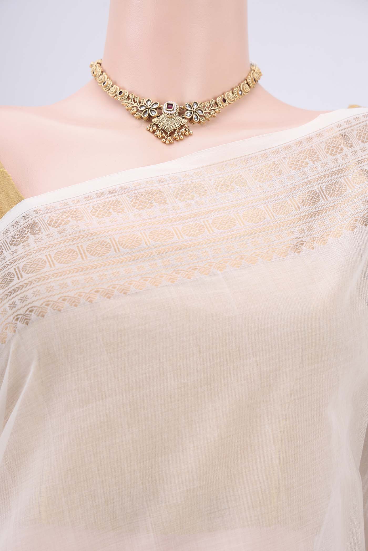 Border image of Off White Kanchi Cotton Saree with Plain Body and Zari Border. 