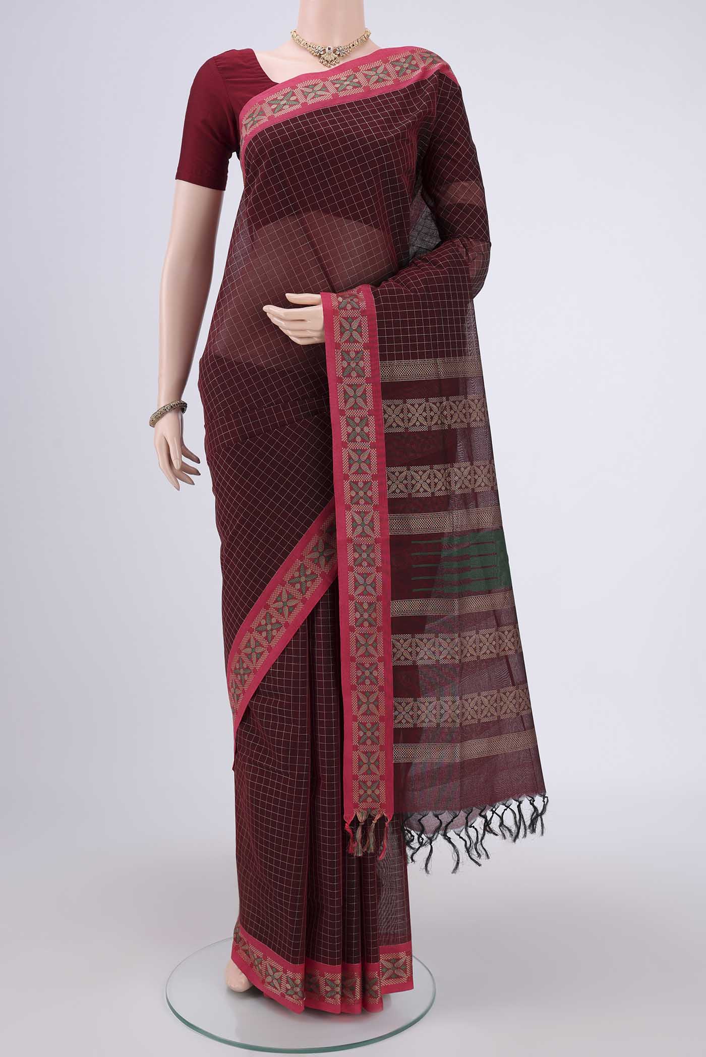 Maroon Coimbatore Cotton Saree with Stripes on the body and Thread Border.  displayed on a mannequin