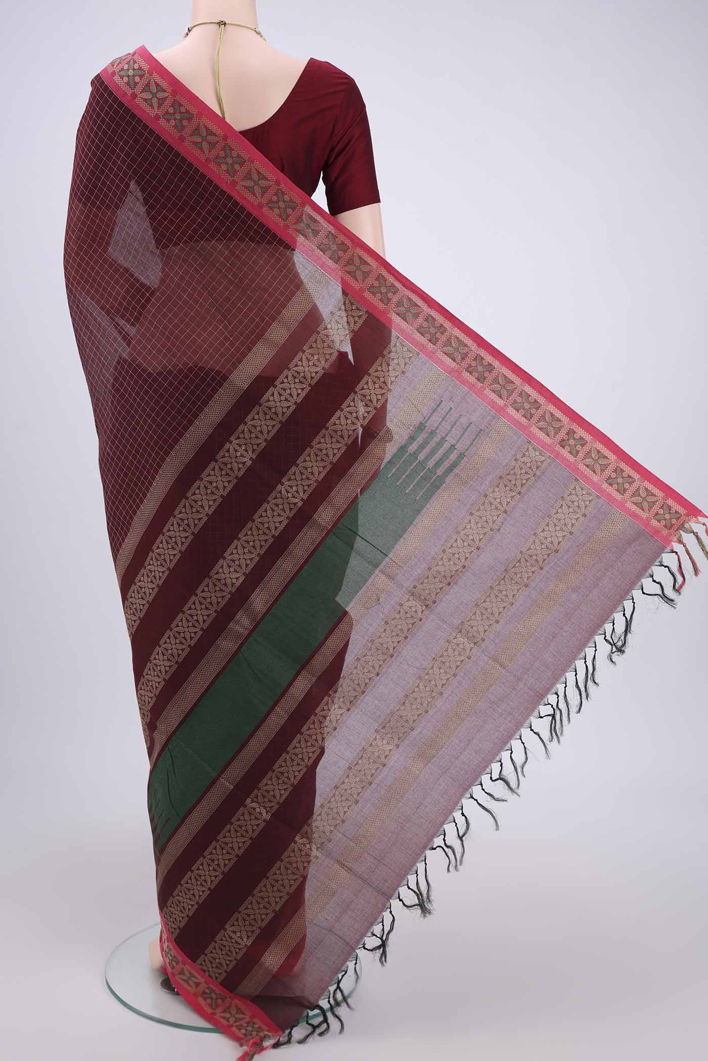 Flat view of Maroon Coimbatore Cotton Saree with Stripes on the body and Thread Border. 