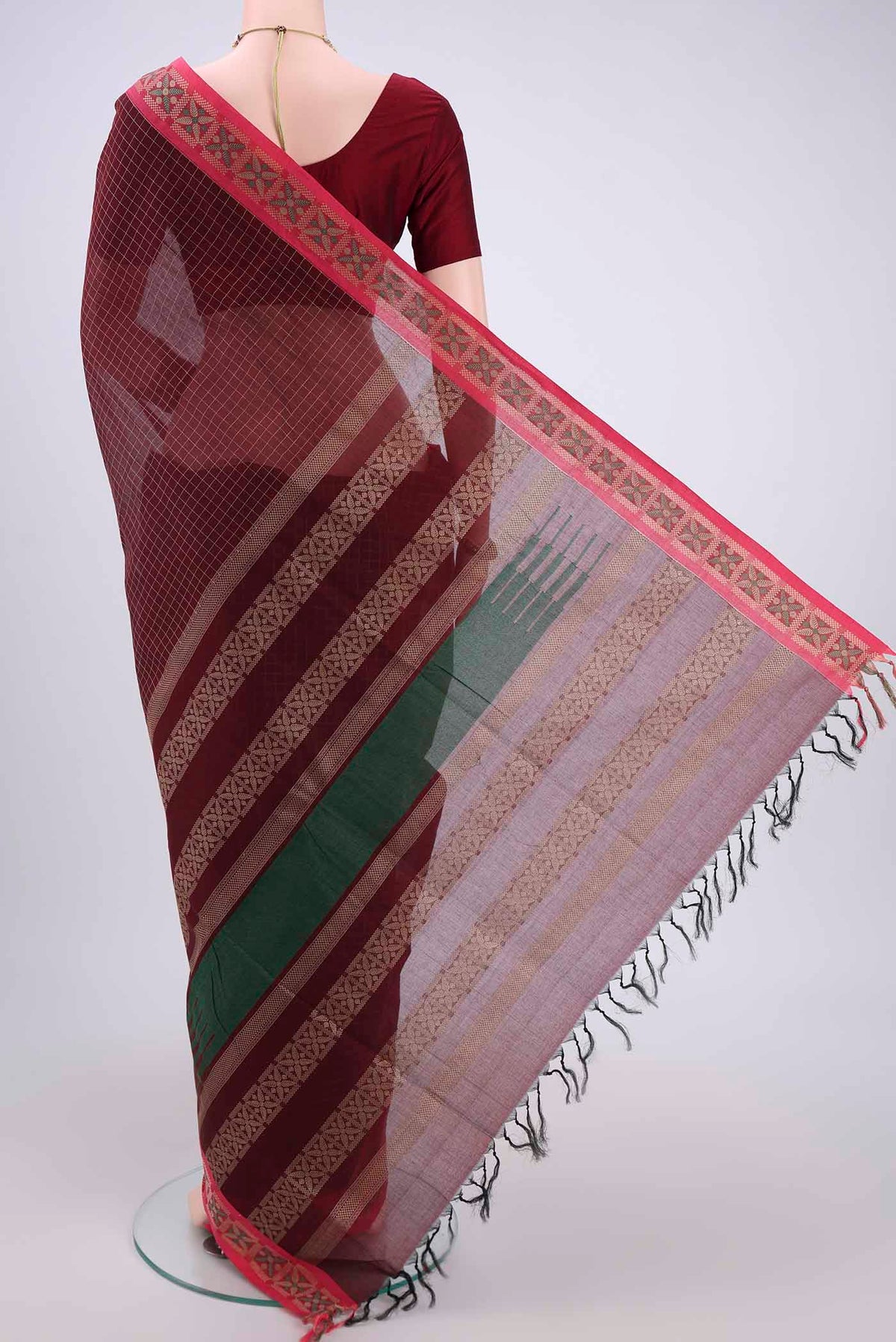 Flat view of Maroon Coimbatore Cotton Saree with Stripes on the body and Thread Border. 