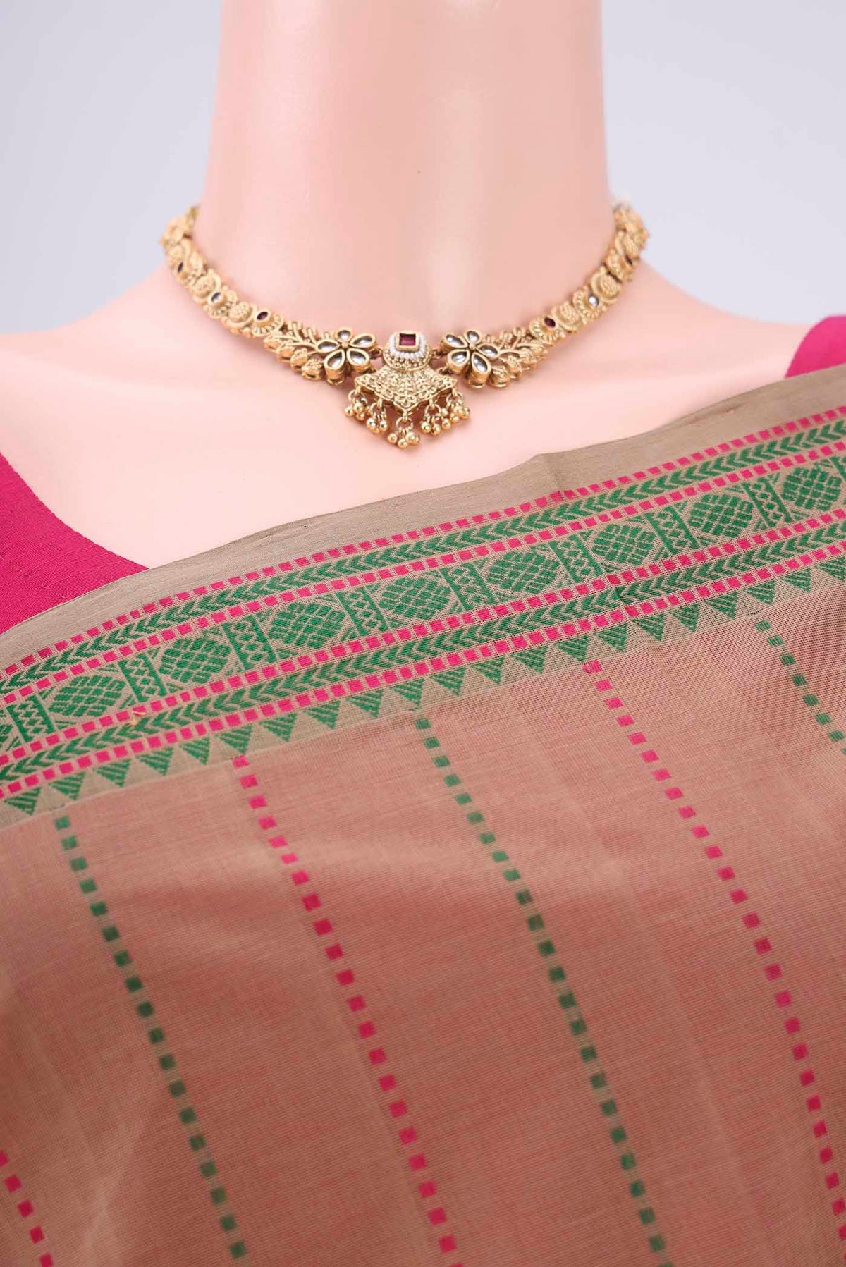 Border image of Beige Coimbatore Cotton Saree with Stripes on the body and Thread Border. 