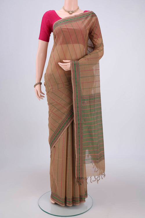 Beige Coimbatore Cotton Saree with Stripes on the body and Thread Border.  displayed on a mannequin