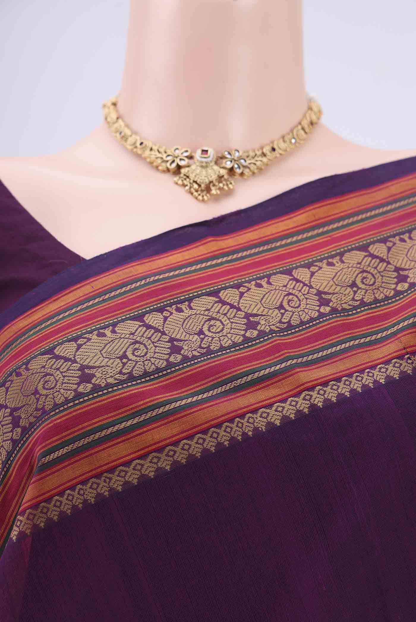 Border image of Purple Coimbatore Cotton Saree with Stripes on the body and Thread Border. 