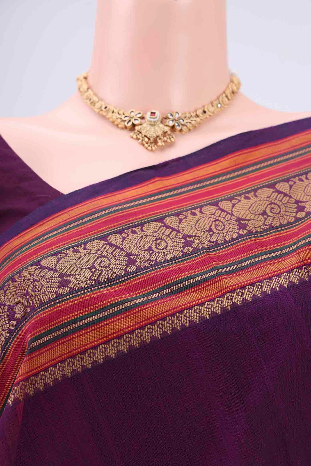 Border image of Purple Coimbatore Cotton Saree with Stripes on the body and Thread Border. 