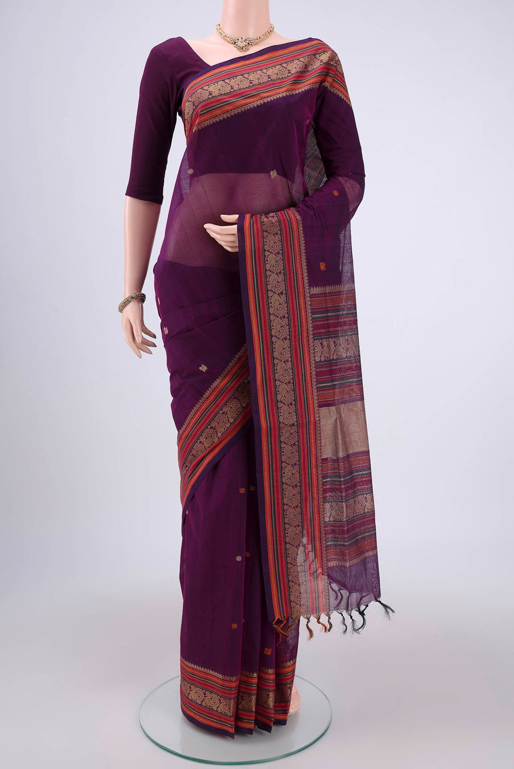 Purple Coimbatore Cotton Saree with Stripes on the body and Thread Border.  displayed on a mannequin