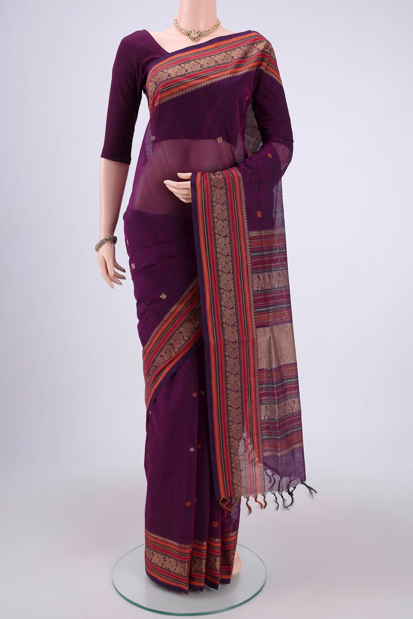 Purple Coimbatore Cotton Saree with Stripes on the body and Thread Border.  displayed on a mannequin