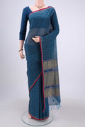 Turquoise Coimbatore Cotton Saree with Stripes on the body and Thread Border.  displayed on a mannequin