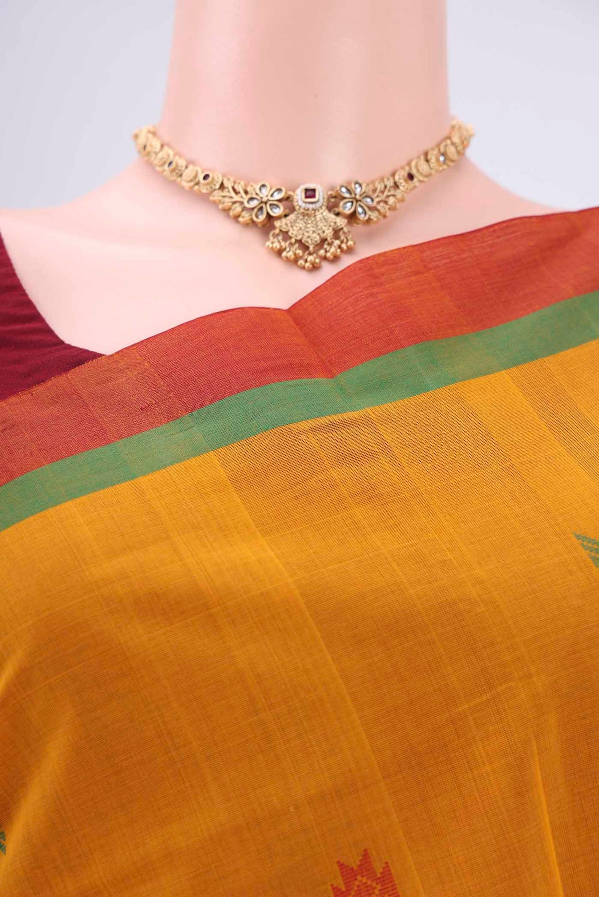 Border image of Mustard Coimbatore Cotton Saree with Stripes on the body and Thread Border. 