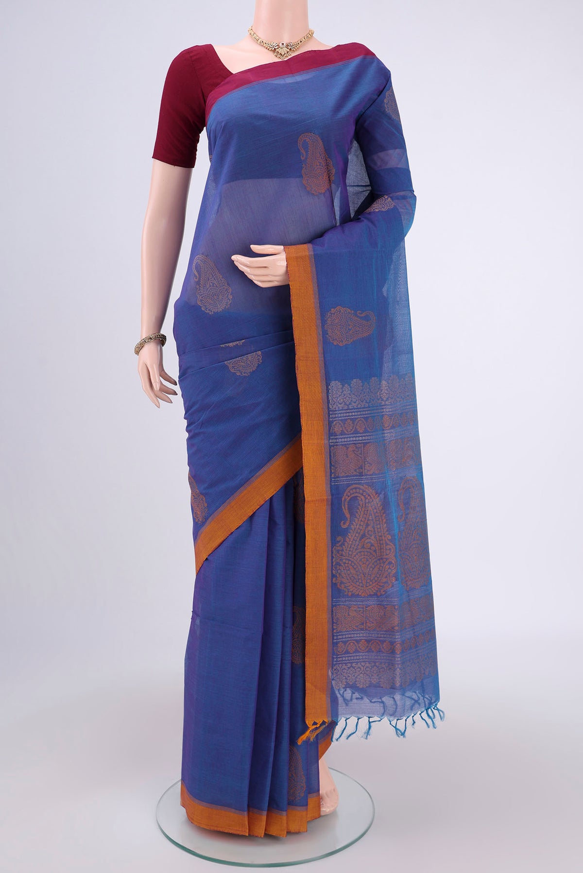 Blue Coimbatore Cotton Saree with Stripes on the body and Thread Border.  displayed on a mannequin