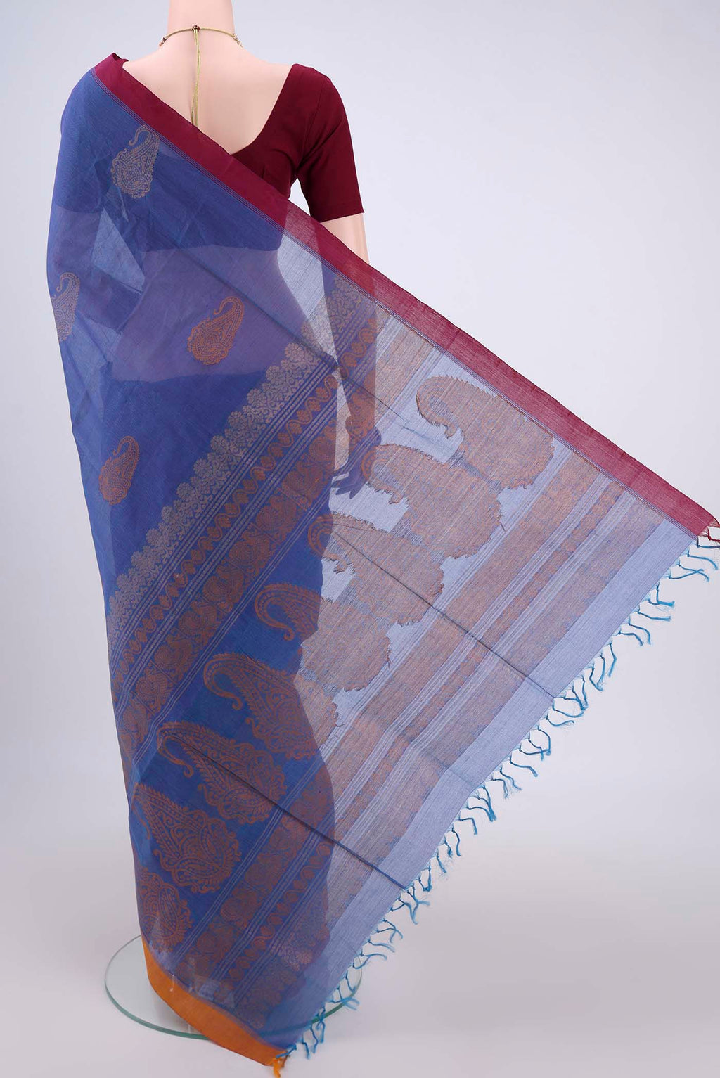Flat view of Blue Coimbatore Cotton Saree with Stripes on the body and Thread Border. 