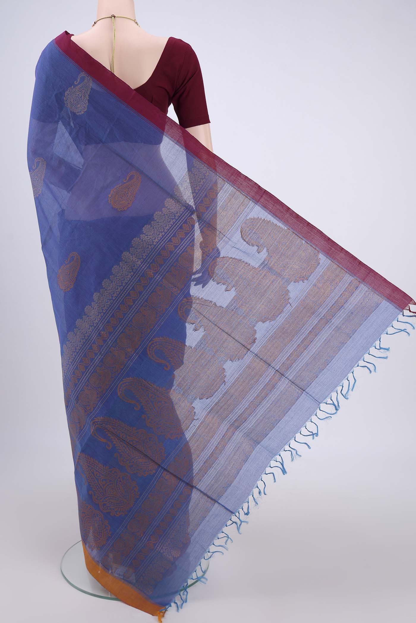 Flat view of Blue Coimbatore Cotton Saree with Stripes on the body and Thread Border. 