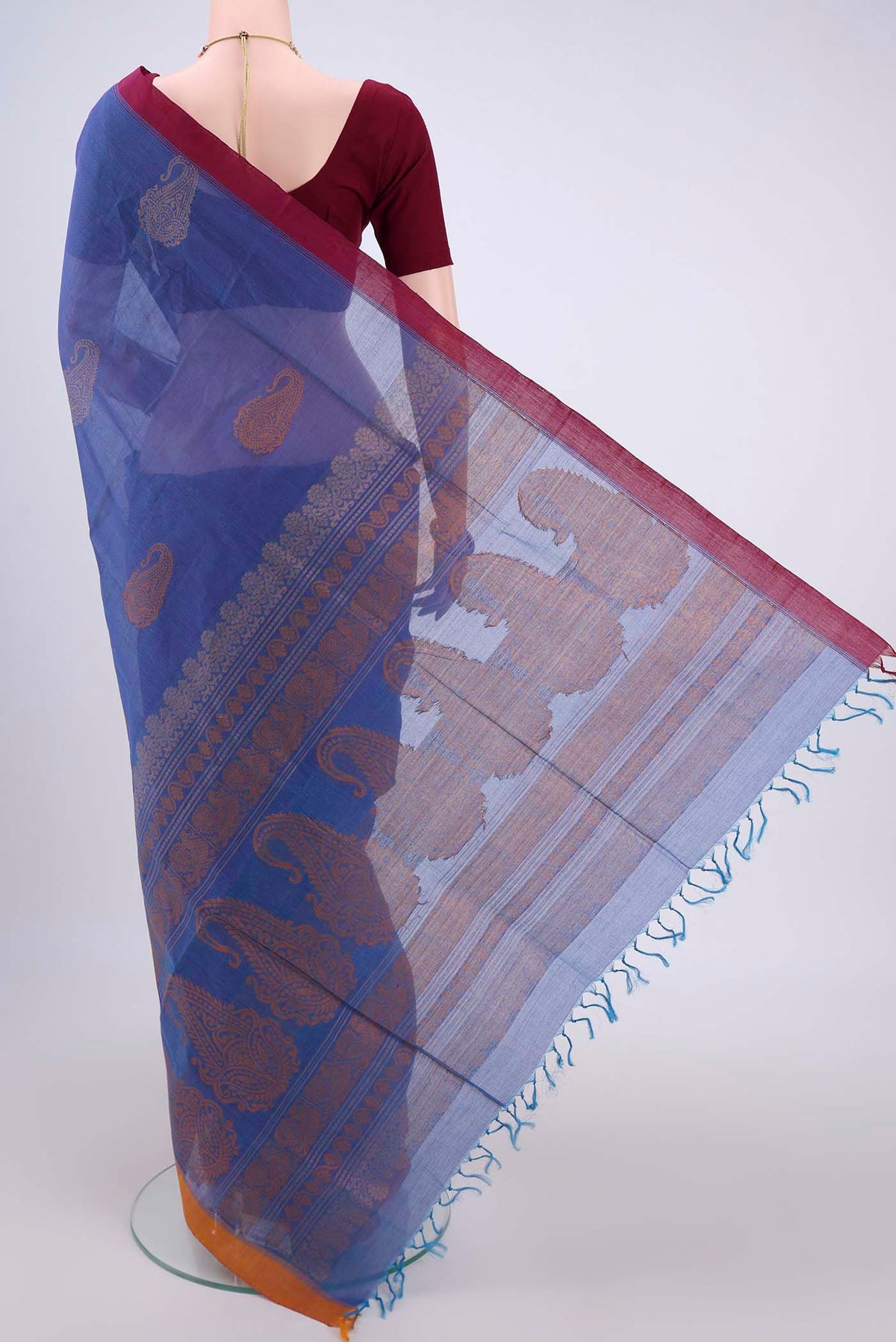 Flat view of Blue Coimbatore Cotton Saree with Stripes on the body and Thread Border. 