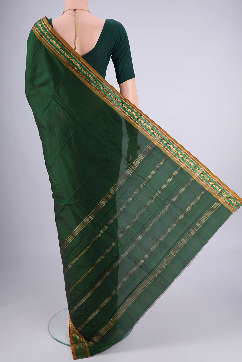Flat view of Bottle Green Blended Bangalore Silk Saree with Jacquard design on the body and Zari Border. 