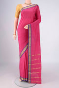 Pink Blended Bangalore Silk Saree with Jacquard design on the body and Zari Border.  displayed on a mannequin