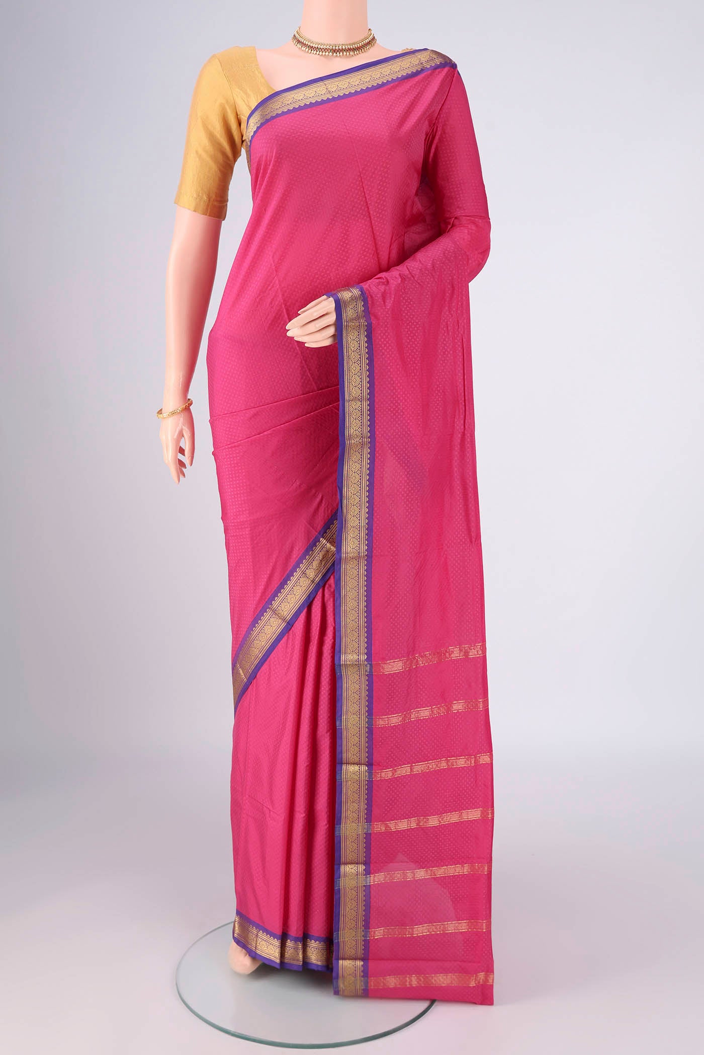 Pink Blended Bangalore Silk Saree with Jacquard design on the body and Zari Border.  displayed on a mannequin