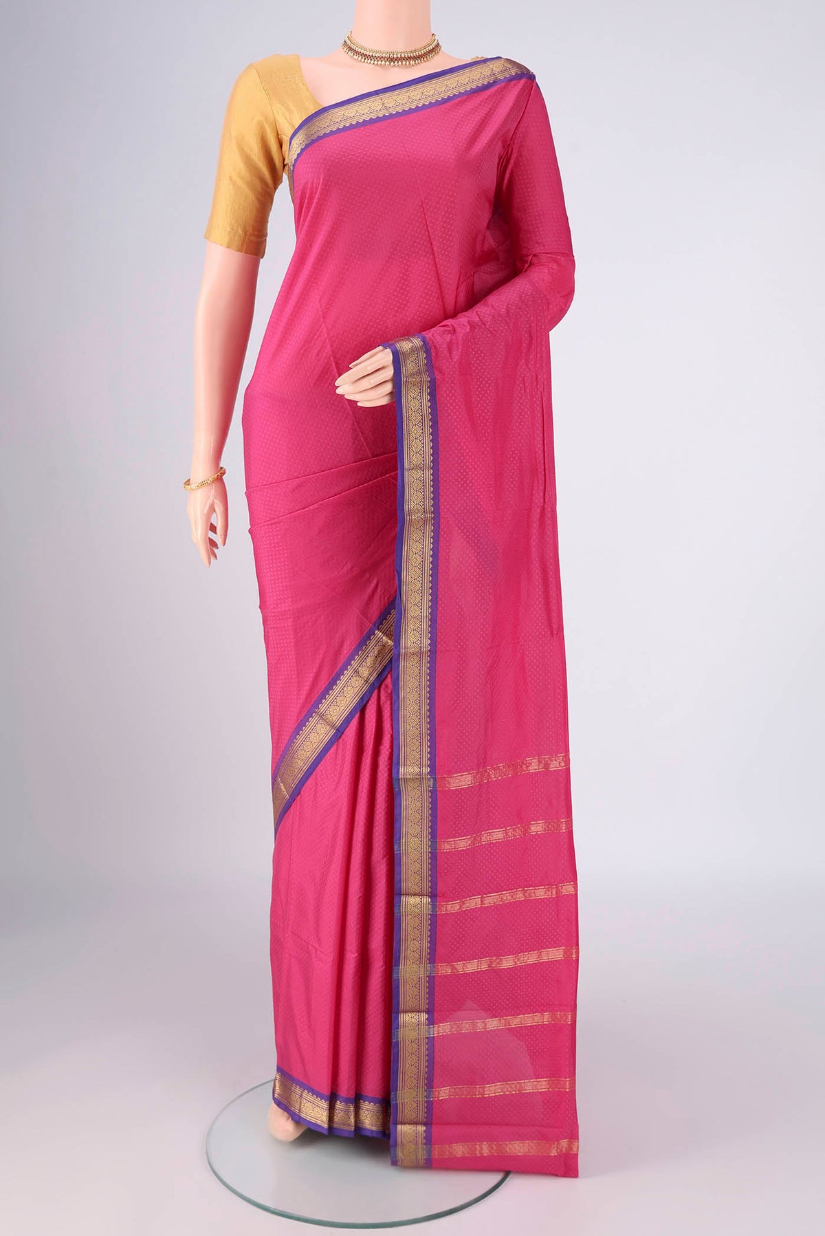 Pink Blended Bangalore Silk Saree with Jacquard design on the body and Zari Border.  displayed on a mannequin