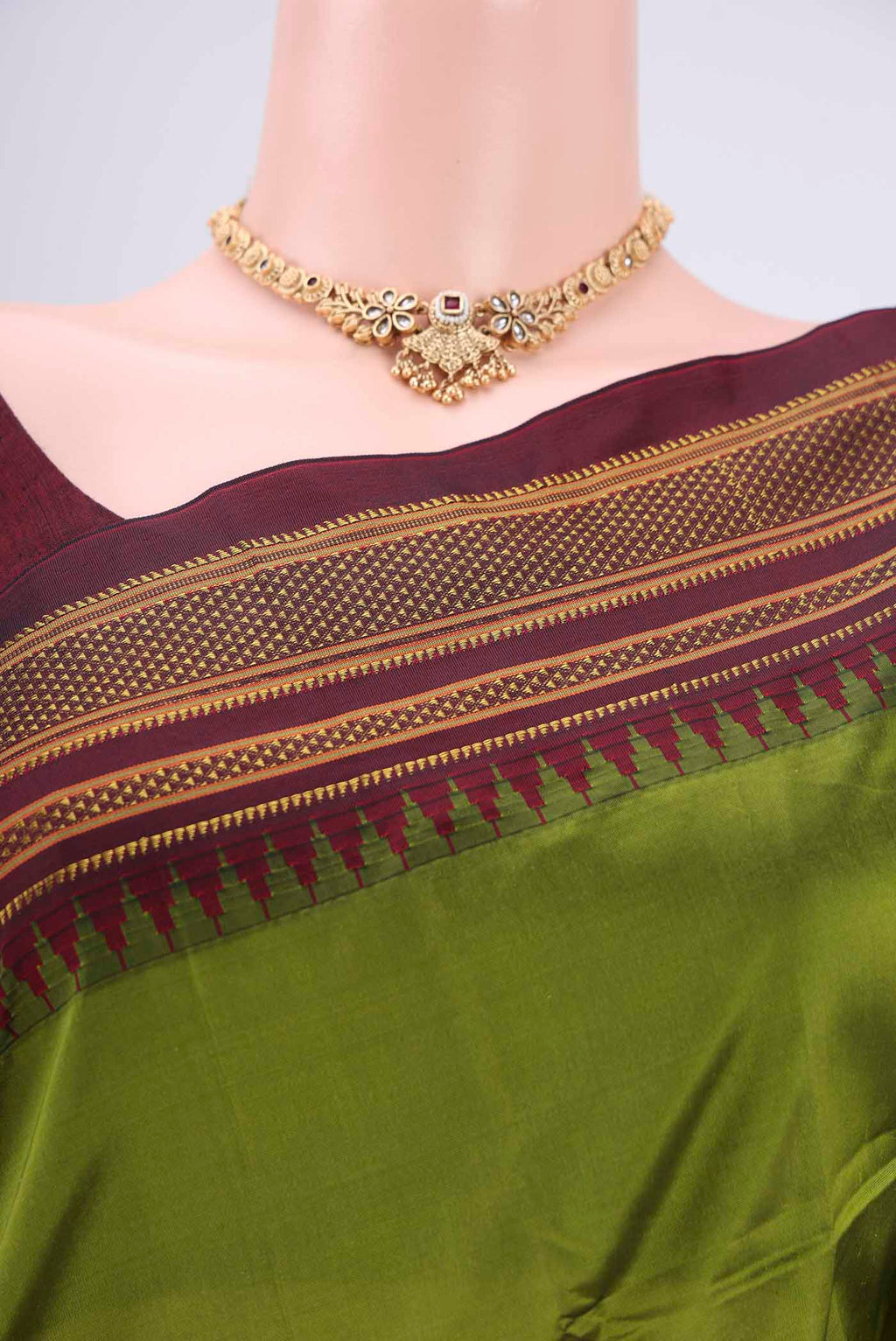 Border image of Green Blended Bangalore Silk Saree with Plain Body and Temple Border. 