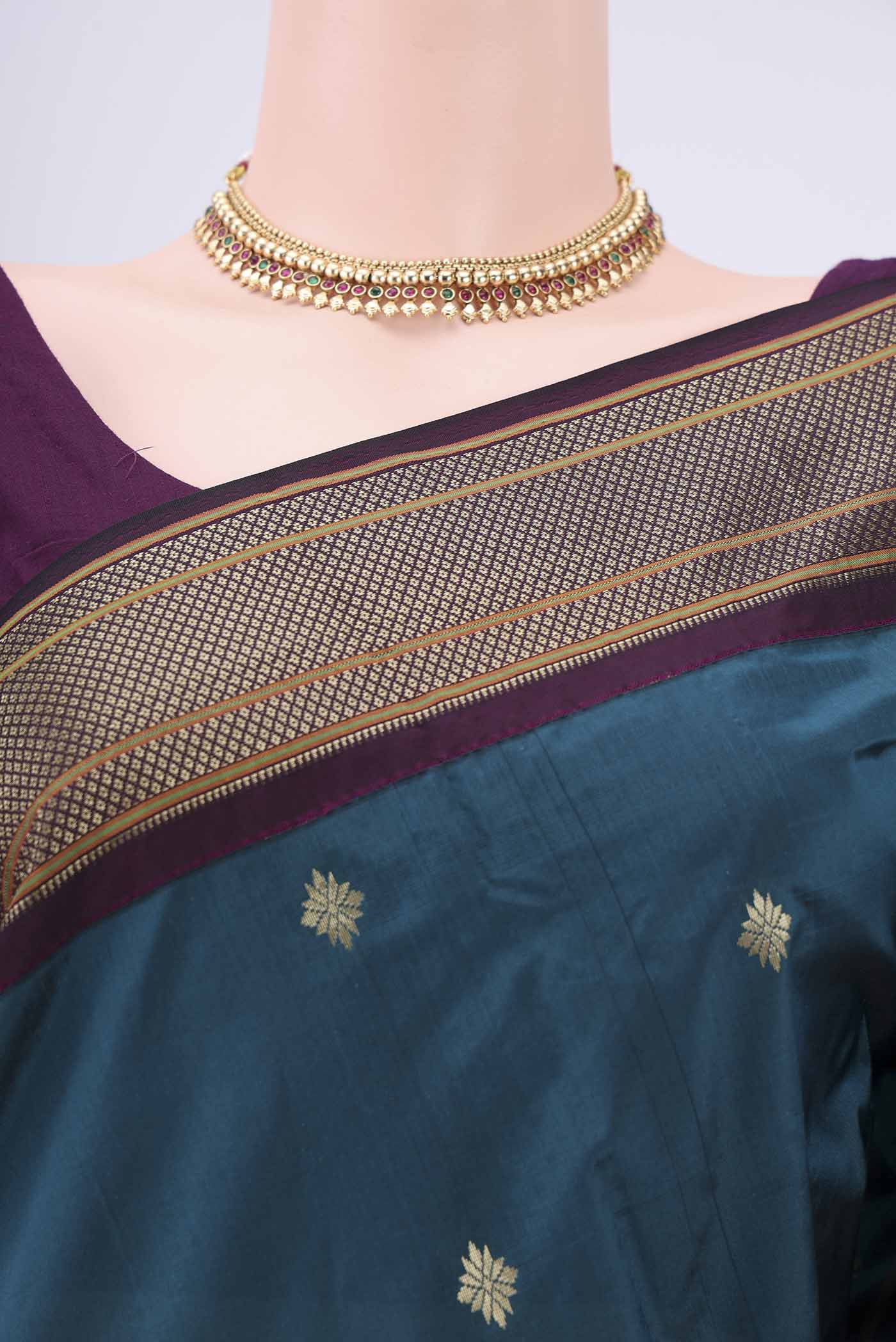 Border image of Green Blended Bangalore Silk Saree with Zari Butta on the body and Zari Border. 