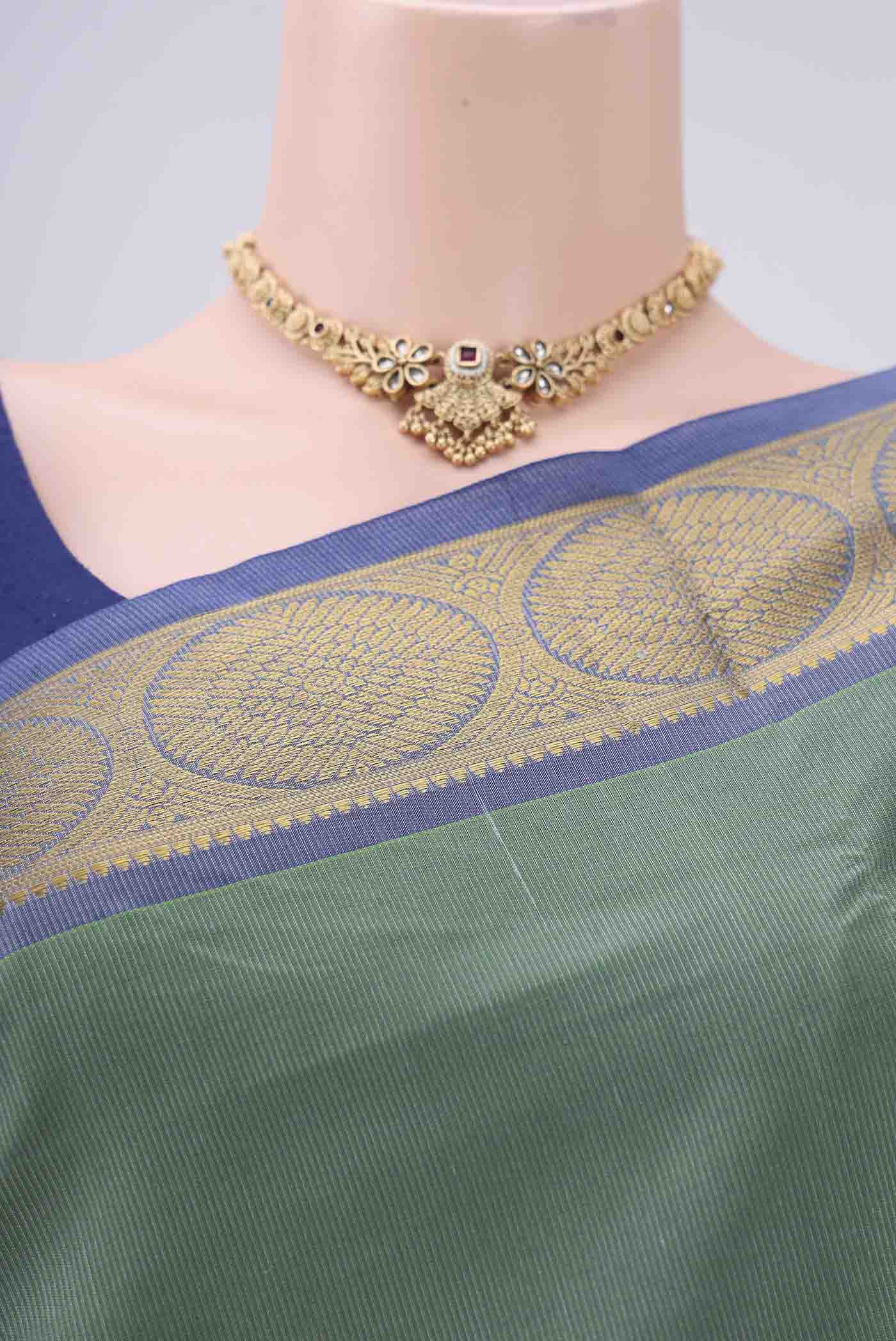 Border image of Sea Green Silk Cotton Saree with Plain Body and Zari Border. 