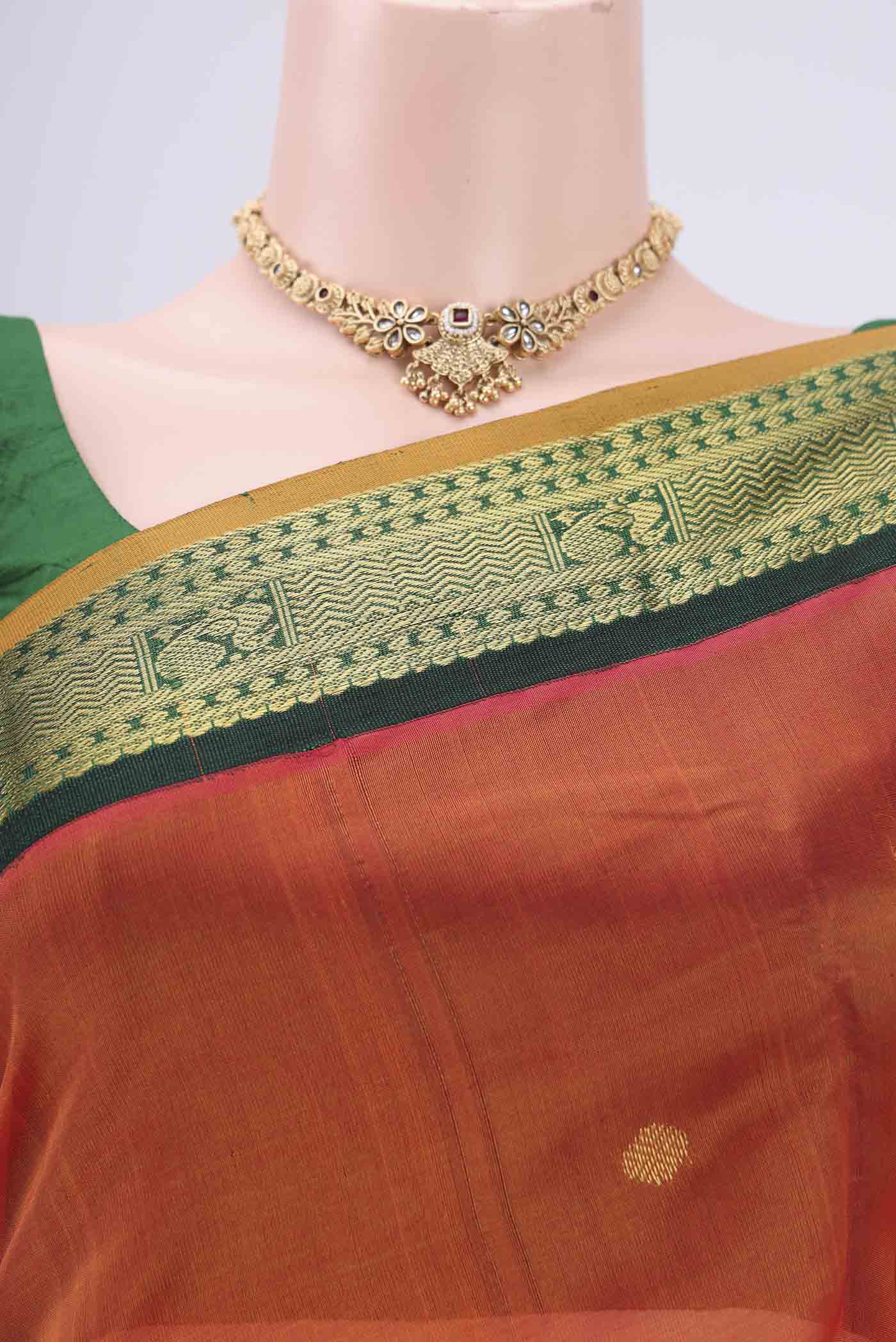 Border image of Orange Silk Cotton Saree with Plain Body and Zari Border. 