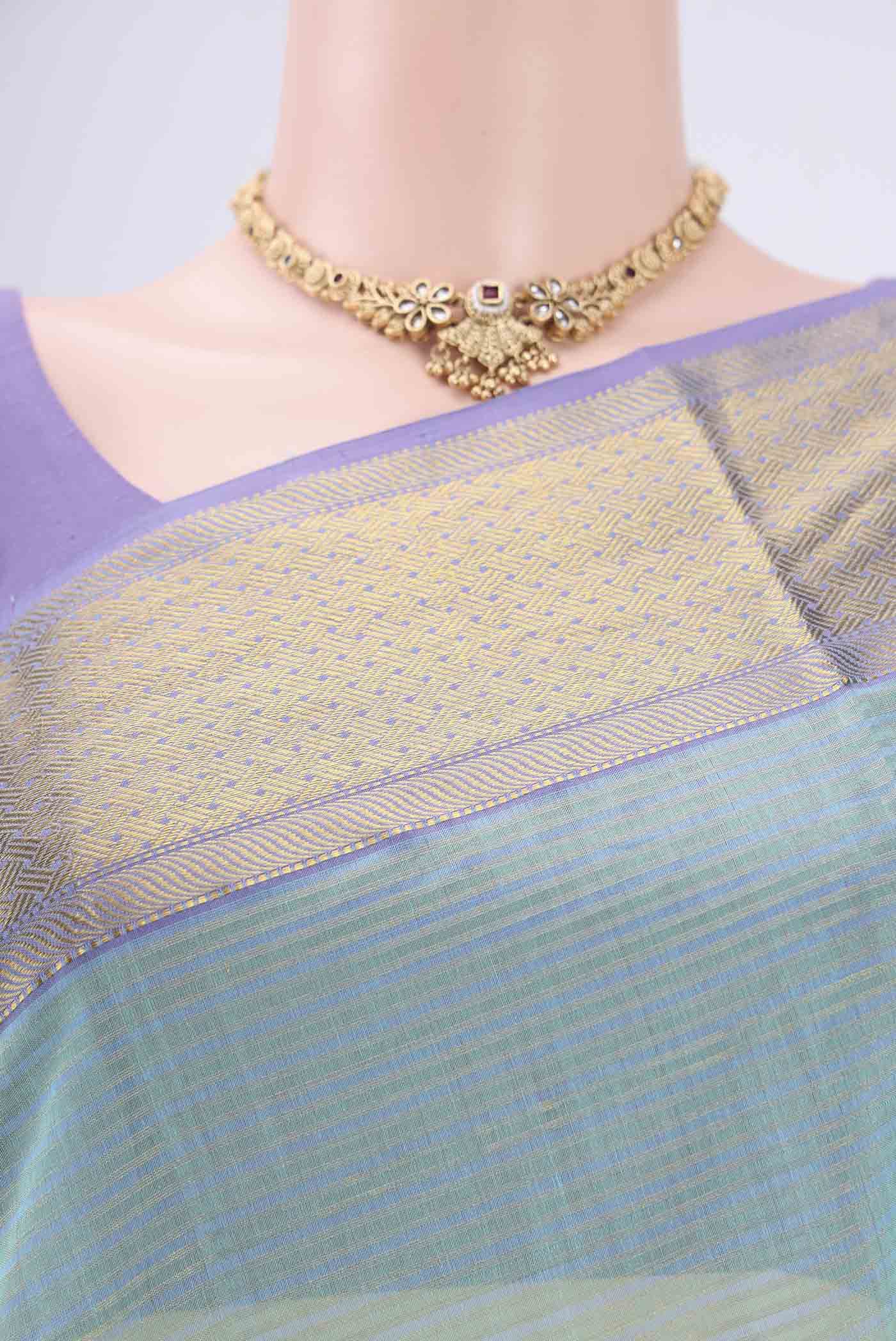 Border image of Sky Blue Maheshwari Silk Cotton Saree with Zari And Thread Butta on the body and Zari Border. 