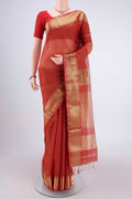 Orange Maheshwari Silk Cotton Saree with Zari And Thread Butta on the body and Zari Border.  displayed on a mannequin