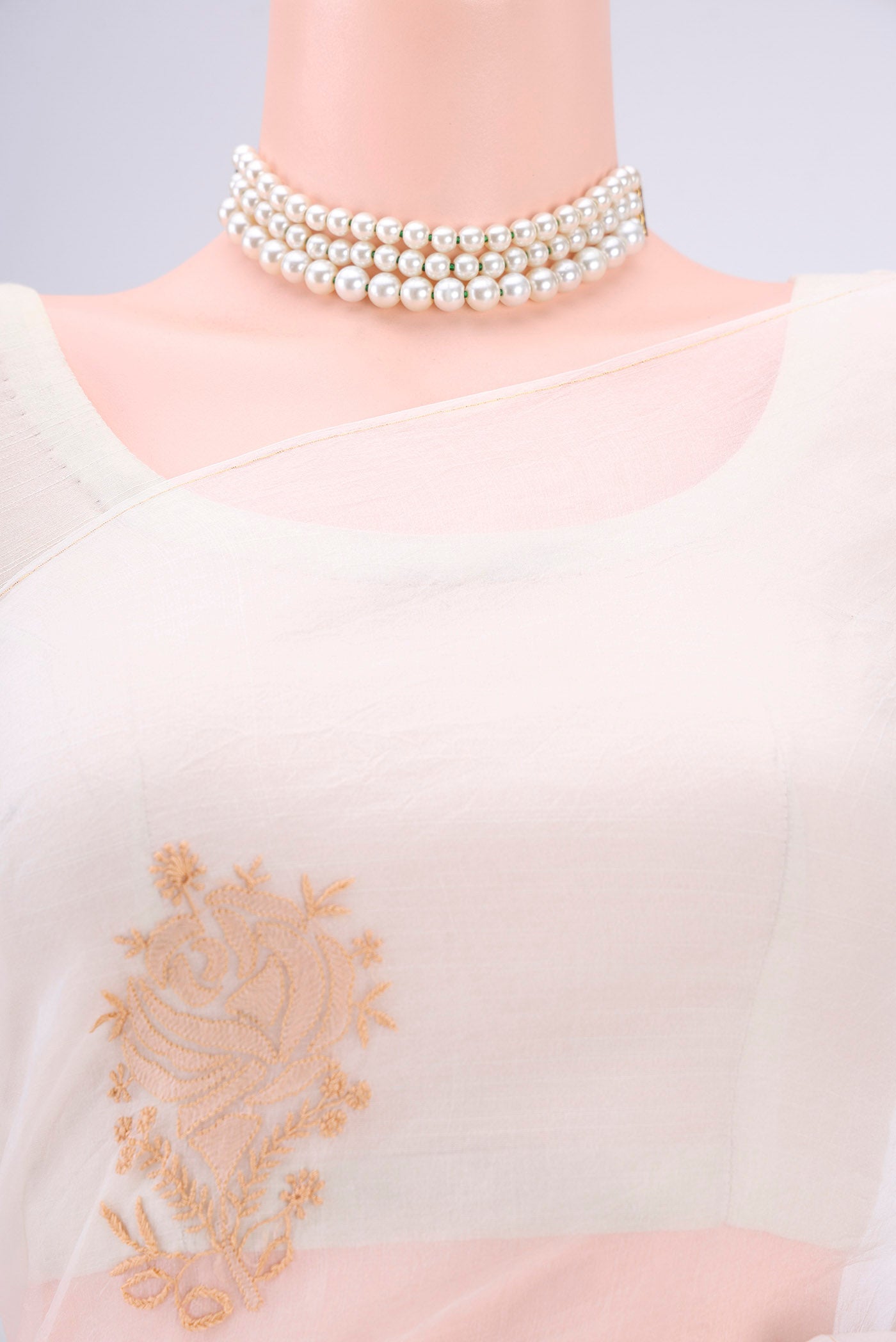 Border image of White Organza Silk Saree with Embroidery on the body and Thin Zari Line. 