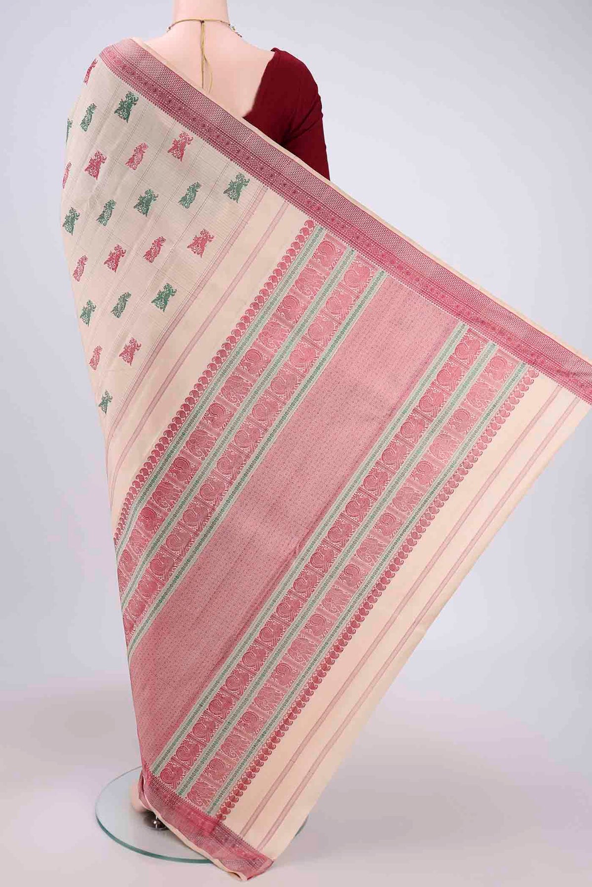 Flat view of Beige Kanchipuram Saree with Thread Butta on the body and Thread Border. 