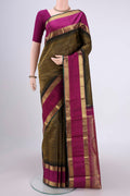 Pure Silk Pure Zari Black Dual Tone Kanjivaram Saree with Jacquard design on the body and Zari Border.  displayed on a mannequin