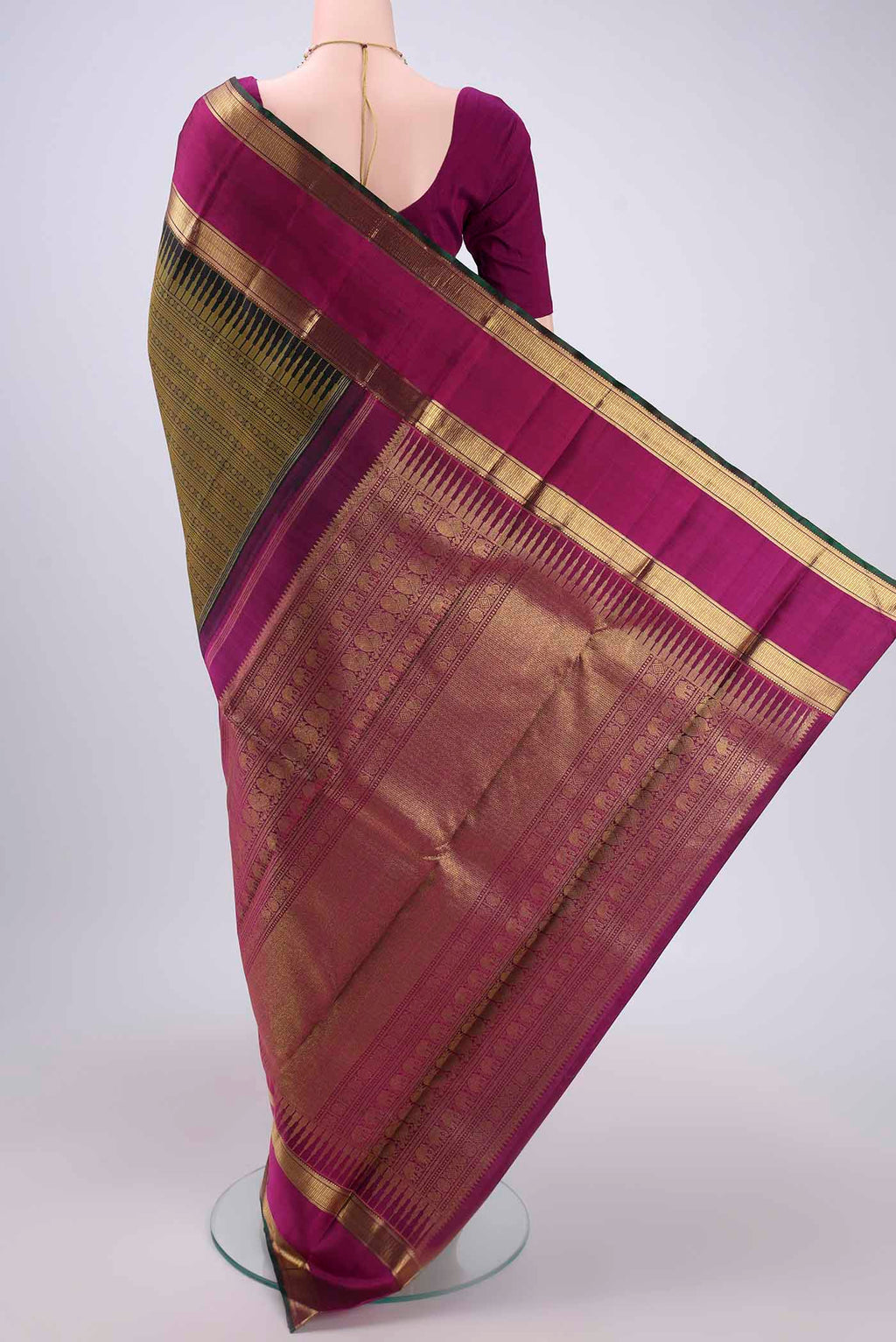 Flat view of Pure Silk Pure Zari Black Dual Tone Kanjivaram Saree with Jacquard design on the body and Zari Border. 